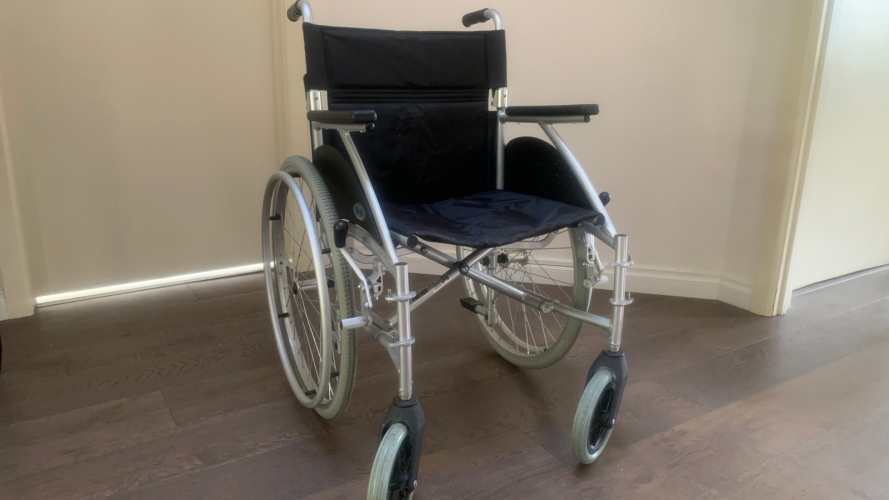 Free Wheelchair (missing footrests).
