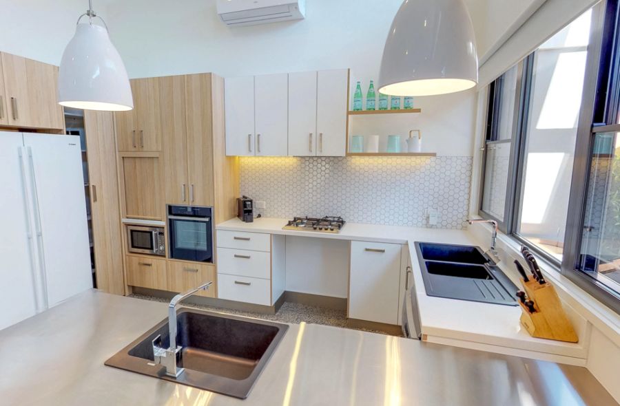 Image of modern accessible kitchen with wheel in stove area